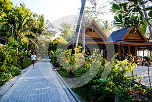 Koh Tao, Thailand, island life. Pedestrian street along the coast of Sairee beach. Standing on the shore of the Bungalow