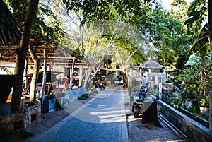 KOH TAO, THAILAND, Island life. A pedestrian street along the coast of Sayri beach is sometimes used by motorcycles