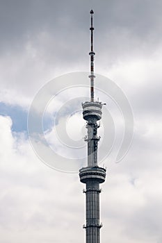 Koktobe Television and radio broadcast tower in Almaty, Kazakhstan. TV towers against the background of a cloudy sky.