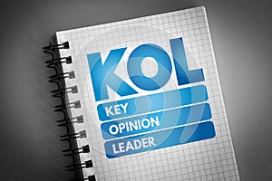 KOL - Key Opinion Leader acronym on notepad, business concept background