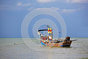 Kolae boat rest in fishing village on Samila Beach