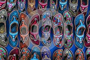 Kolhapuri Chappal- Colorful and variety of Ladies Ethnic Footwear displayed on sale at the street market in India. Kolhapuri photo