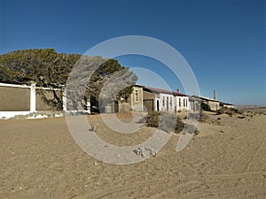 Kolmanskop `afrique. Kolmanskop, German. Kolmannskuppe is an abandoned town in Namibia, located in the Namib desert.