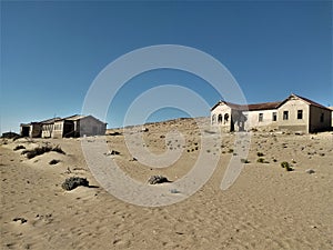 Kolmanskop `afrique. Kolmanskop, German. Kolmannskuppe is an abandoned town in Namibia, located in the Namib desert.