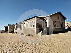 Kolmanskop `afrique. Kolmanskop, German. Kolmannskuppe is an abandoned town in Namibia, located in the Namib desert.