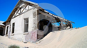 Kolmanskop ghost town sinking in sand sea Namibia