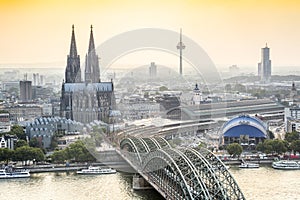 Koln cityscape with cathedral and steel bridge, Germany