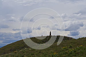 The kolob statue on top of ensign peak photo