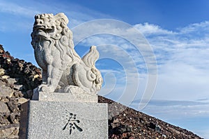 Komainu lion-dog guardian statue of Kusushi Shinto Shrine on the