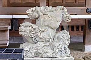 Komainu, or lion-dog, at Kasuga jinja shinto shrine, Kanazawa, Japan