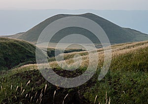 Komezuka volcanic cone after sunset - in Aso caldera, Kumamoto prefecture, Japan