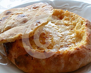 Komplet lepinja is specialty of Western Serbia made from buns, pretop, egg and cream.