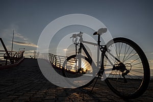 Sunset and cycling at Baris Manco bridge photo