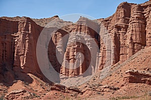 Konorchek canyon, sheer cliffs subject to erosion, travel destination, famous landmark Kyrgyzstan, Central Asia