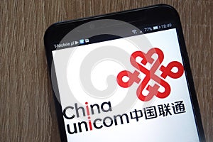 China United Network Communications logo displayed on a modern smartphone