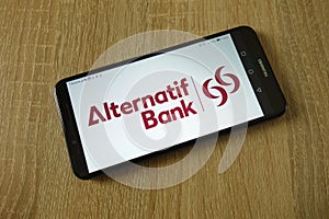 Alternatif Bank logo displayed on smartphone