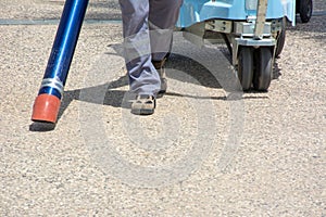 Konyaalti beach, Antalya, Turkey, vacuuming garbage