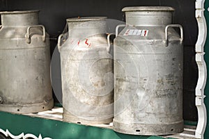 Koog aan de Zaan, Netherlands. July 2022. Old milk cans at a farm in Koog aan de Zaan.