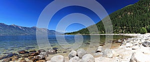 Kootenay Lake Beach with Mountains of Darkwoods National Conservation Area, British Columbia, Canada