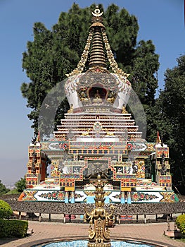 Close-up of Tibetan style stupa or chorten, at Kopan Monastery, a Tibetan Buddhist temple, in Kathmandu, Nepal photo