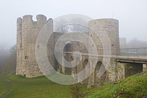 Koporye fortress close-up, morning autumn fog. Leningrad region, Russia