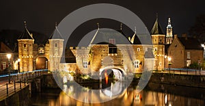 The Koppelpoort at night, medieval gate in dutch city of Amersfoort