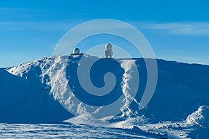 Kor Alps - Panoramic view of austro control Goldhaube on snow covered mountain peak Grosser Speikogel in Kor Alps