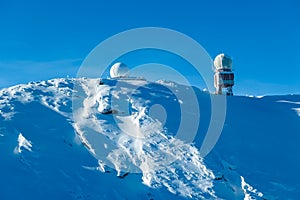 Kor Alps - Panoramic view of austro control Goldhaube on snow covered mountain peak Grosser Speikogel in Kor Alps