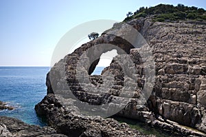 Korakonissi bay with stone bridge formation, Zakynthos, Greece