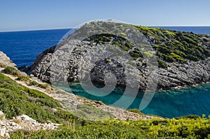 Korakonissi - natural pool of warm turquoise crystal clear water