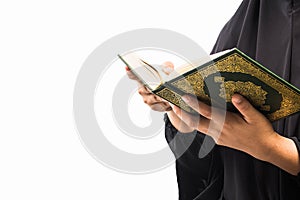 Koran in hand - holy book of Muslims( public item of all muslims )Koran in hand muslims woman