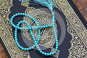 Koran holy book with rosary