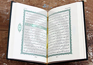 Koran holy book with rosary