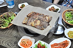 Korean barbecue cuisine with side dishes served on