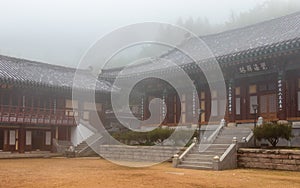 Korean Buddhistic Temple Daeseongam, Great Saint Hermitage, near Beomeosa on a foggy day. Located in Geumjeong, Busan, South Korea