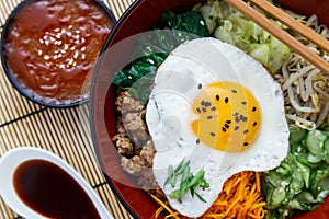 Korean cuisine, beef Bibimbap in a clay pot on