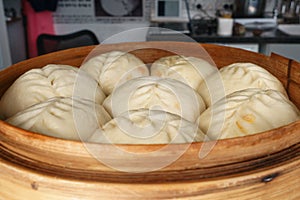 Korean delicious steamed dumplings in bamboo basket