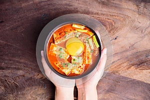 Korean food Kimchi Jjigae, Kimchi soup with tofu and egg photo