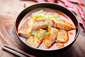 Korean food Kimchi Jjigae, Kimchi soup with tofu and pork photo