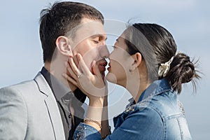 Korean girl embrasing and kissing her european boyfriend