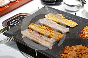 Korean grilled pork belly BBQ Samgyeopsal Gui - The popular Korean barbecue dish.