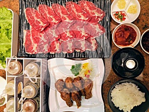 Korean grilled pork tenderlion with rice and side dishes