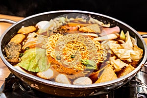 Korean Hot pot \'Budae Jjigae\' is Korean fusion food incorporates American style with noodle, ham, sausages, and Kimchi