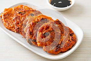 Korean Kimchi pancake or Kimchijeon - Fried Mixed Egg, Kimchi, and Flour