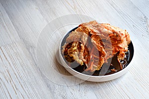 Korean kimchi sidedish on neutral background.