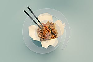 Korean noodles in white box on bright blue background color.