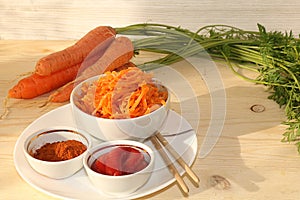 Korean side dish for barbecue dinner, carrots with sauce and hot pepper, A set of fermented foods that are good for intestinal