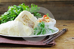 Korean steam meat pies (pigodi) served with soy sauce