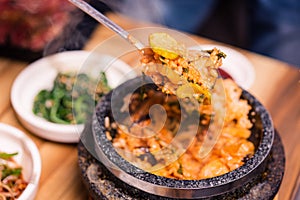 Korean traditional dish- bibimbap mixed rice with vegetables Include beef and fried egg