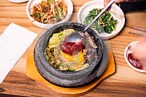 Korean traditional dish- bibimbap mixed rice with vegetables Include beef and fried egg